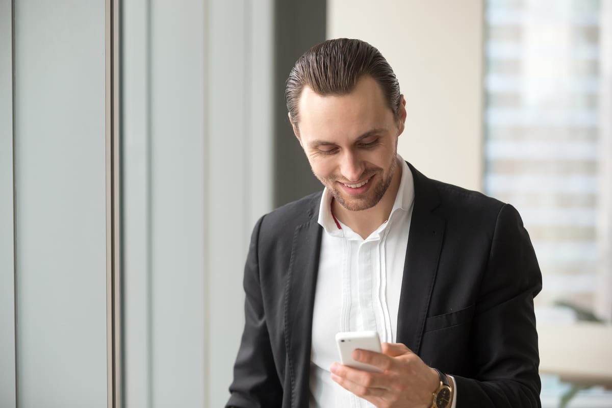 Writing a WhatsApp Business profile description on a smartphone