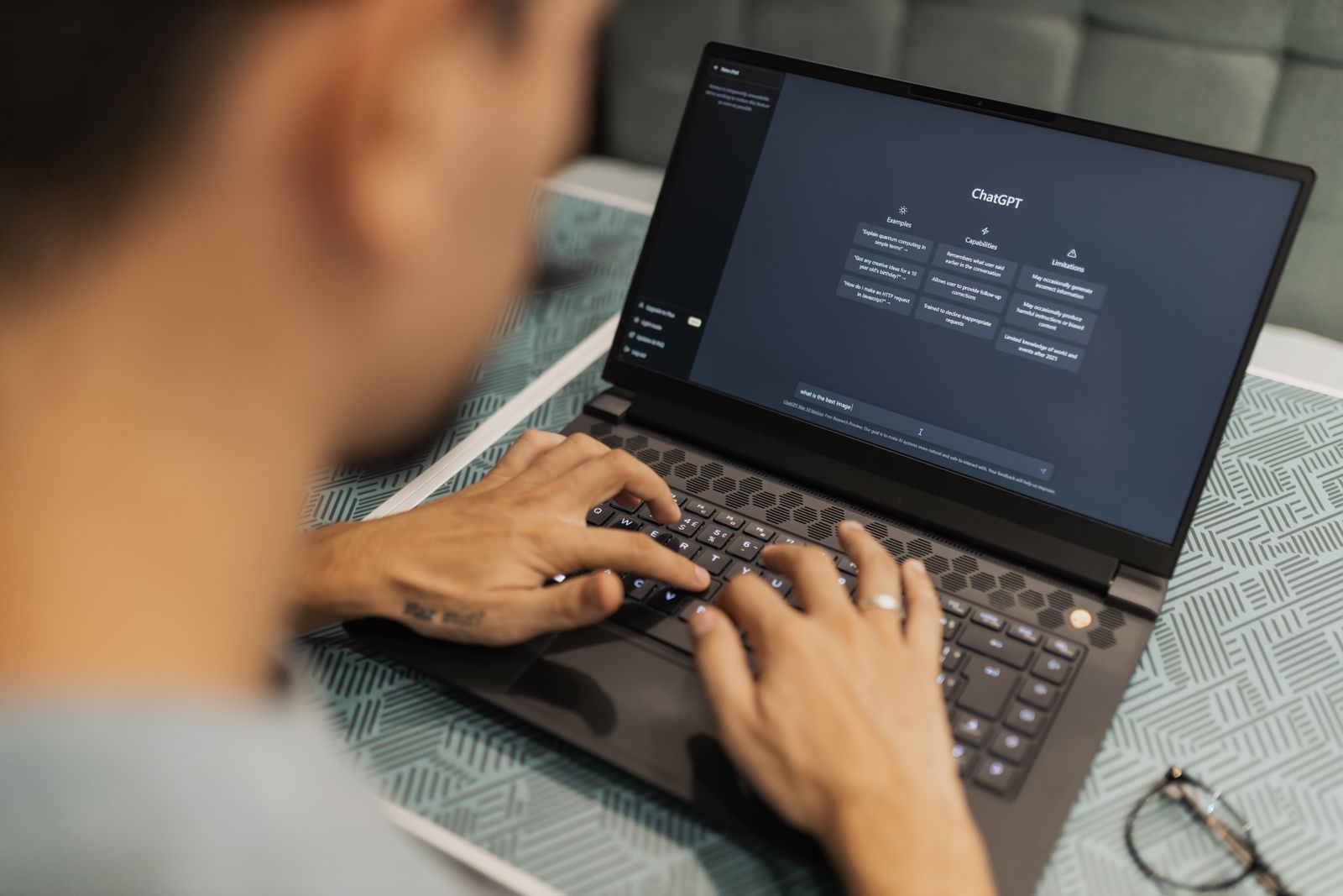 Marketer editing an AI-drafted article on a laptop, the everyday reality of AI content SEO in 2026