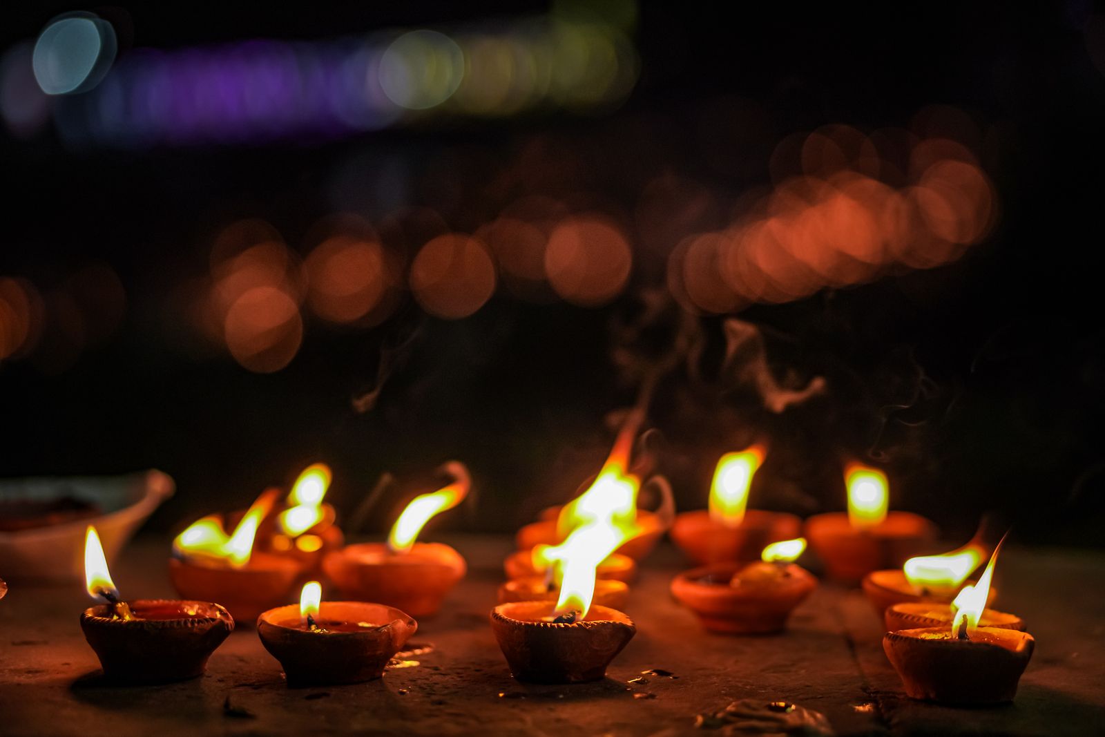 Rows of lit diyas at night, the peak window for festive season marketing in India