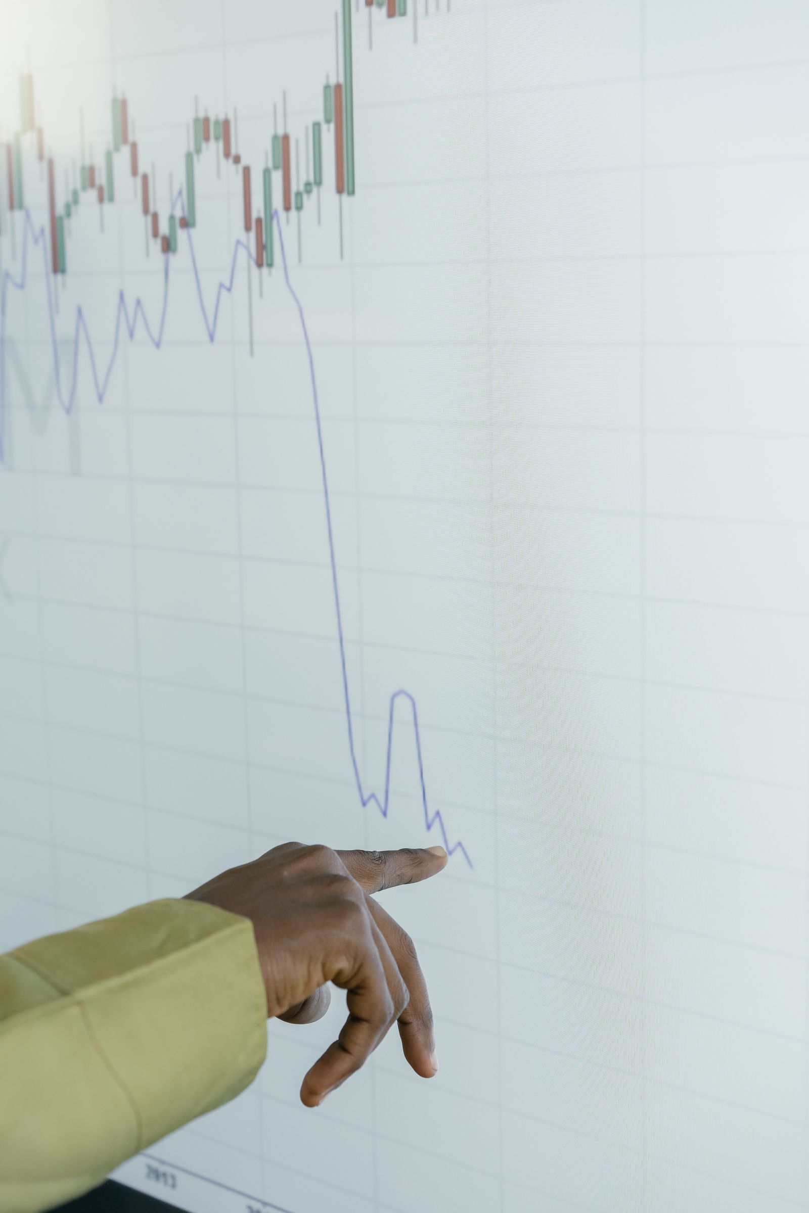 Business owner studying a declining traffic chart to work out why a Google ranking dropped