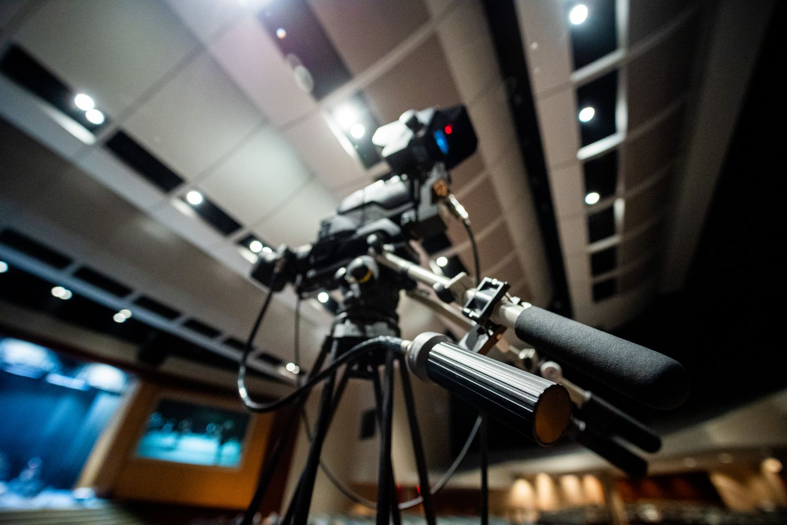 Smartphone mounted on a tripod recording a video, a simple video marketing setup for a small business