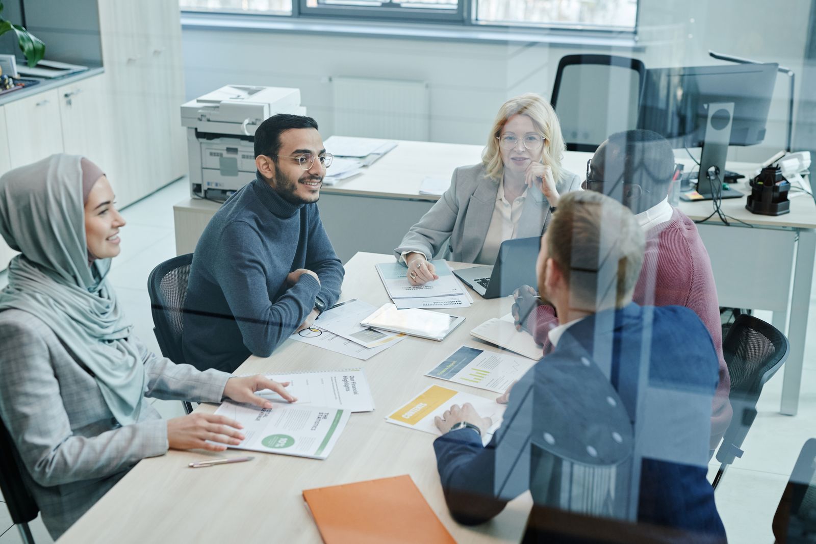Marketing team in a meeting planning a digital marketing strategy for an Indian business